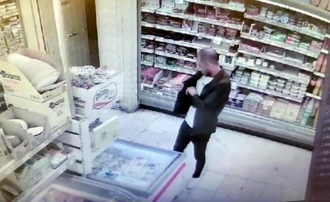 Tekirdağ'ın Çorlu ilçesinde, kimliği belirsiz kişi, markette, reyondan çaldığı et